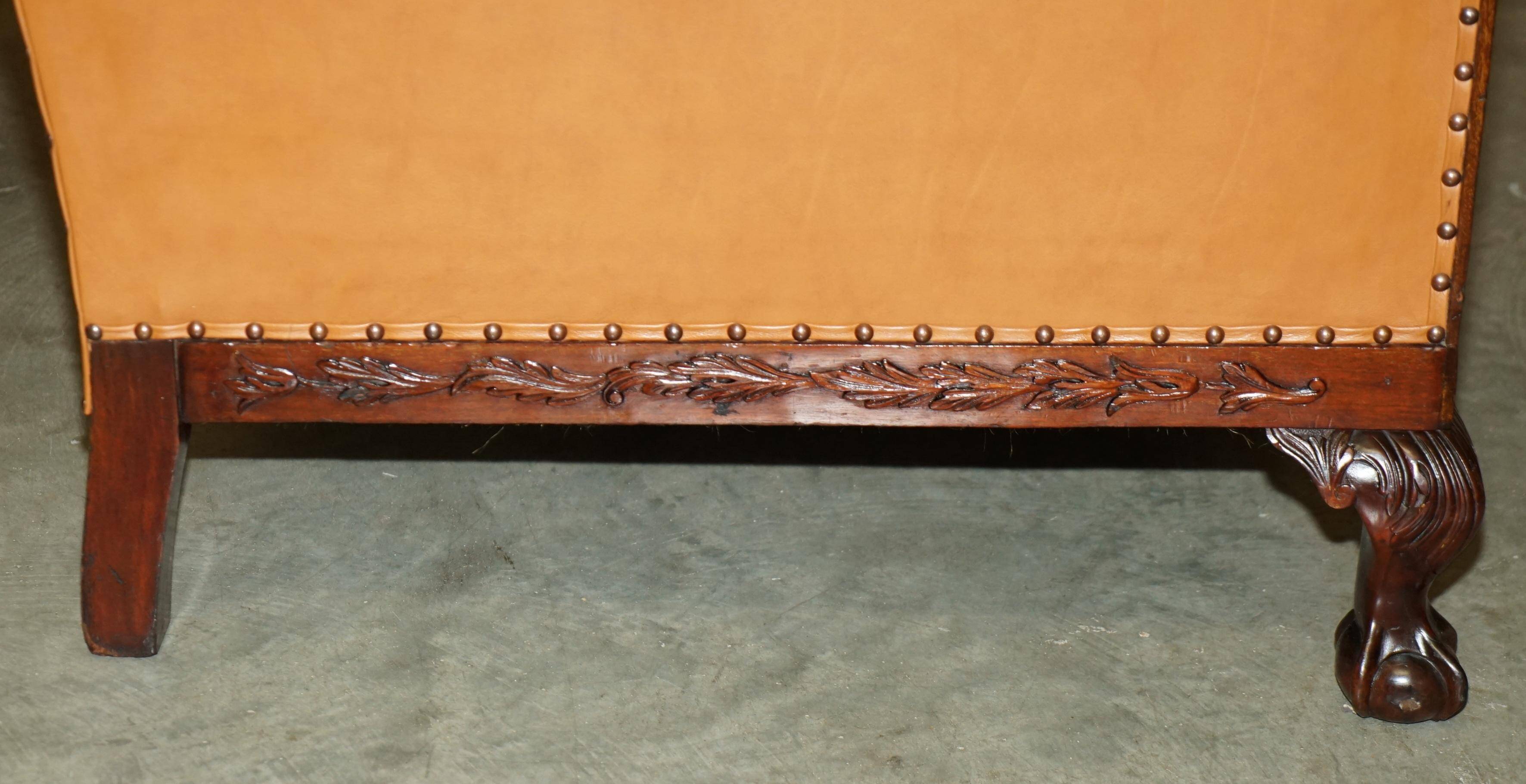 Restored three-seater leather canapé in late Victorian style.