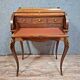 cylinder desk in Louis XV style, elegant and very decorative.