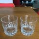 Mismatched decanter and whiskey glasses