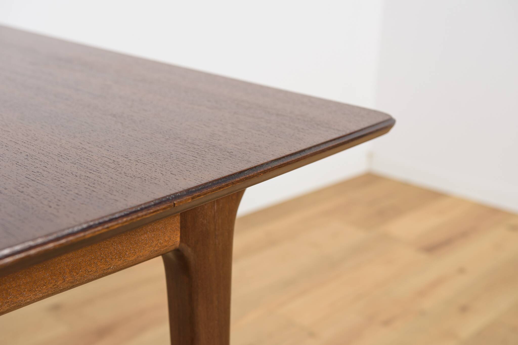 Extendable teak dining table in Mid-Century style from McIntosh, UK.