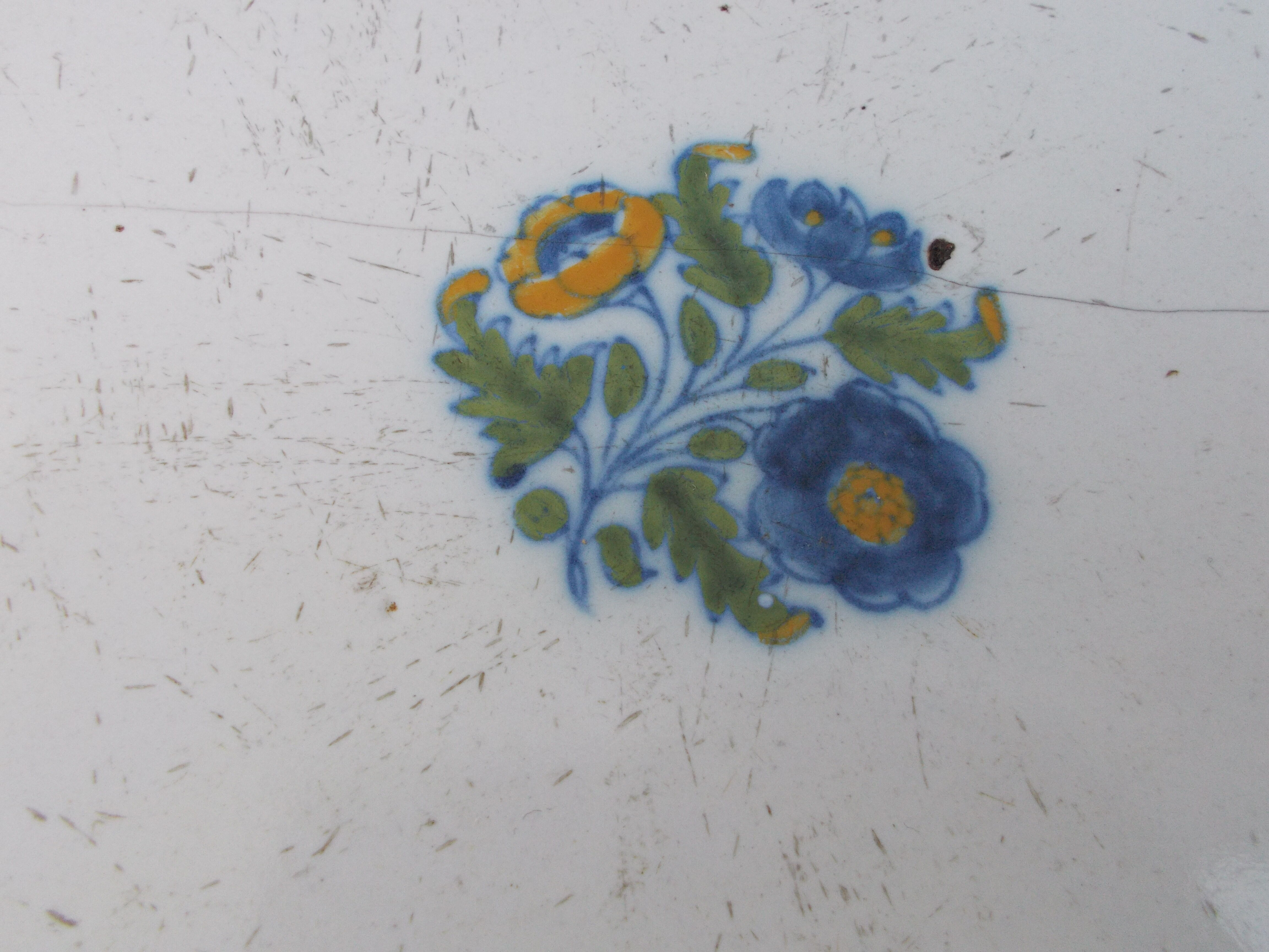 Old faience plate of Moustiers