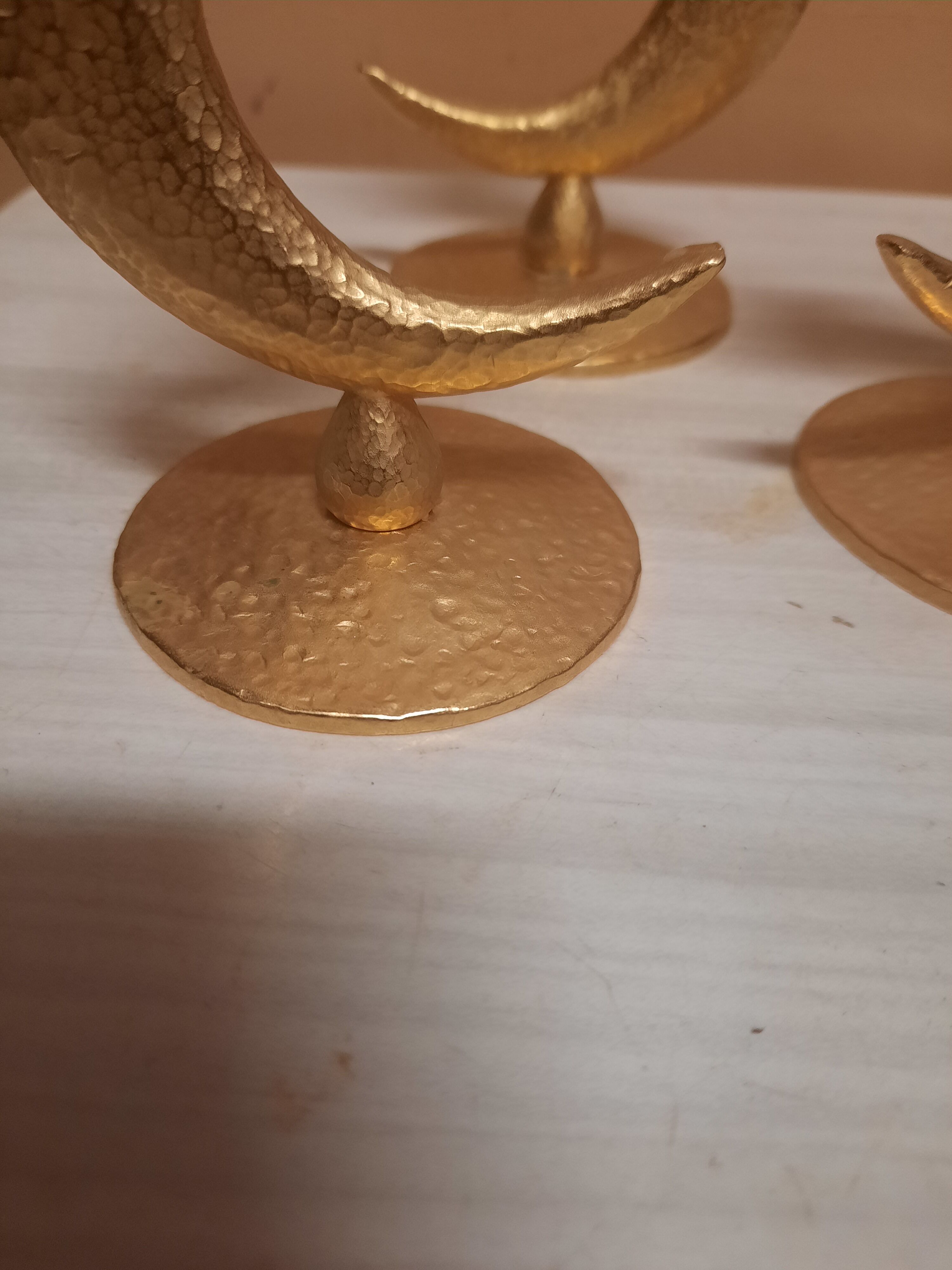 Set of 3 golden candlesticks created by Édouard Rambaud