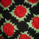 Housse de coussin crochet noir vert et rouge 35X50