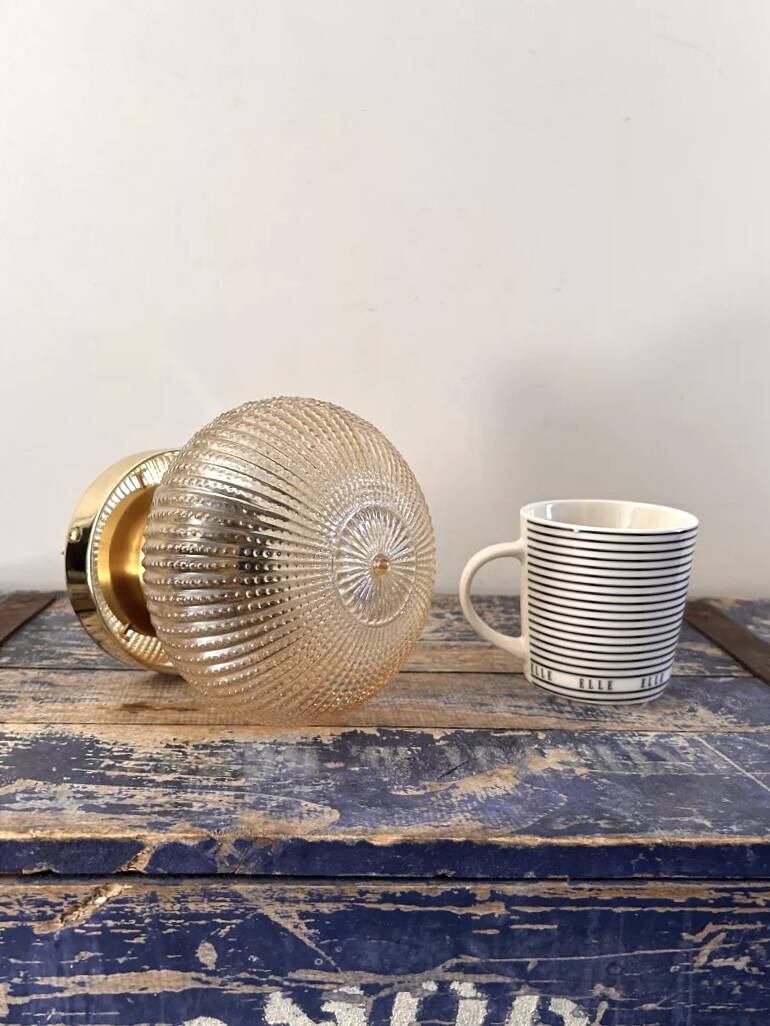 Golden globe wall light