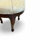 An antique Italian bar chair and a matching tufted vanity stool.
