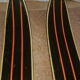 Old skis wooden and its pair of sticks