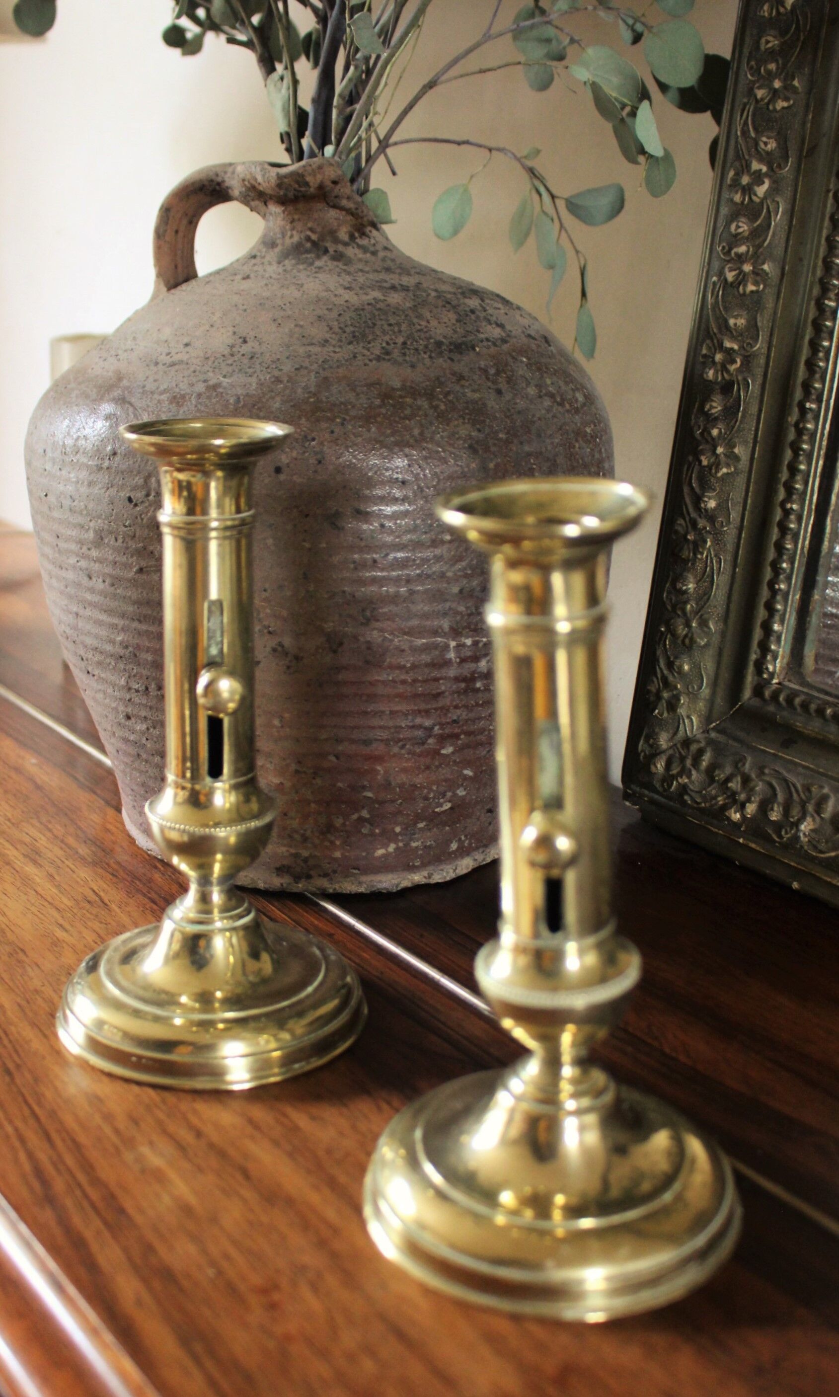 Pair brass candle holders with pusher