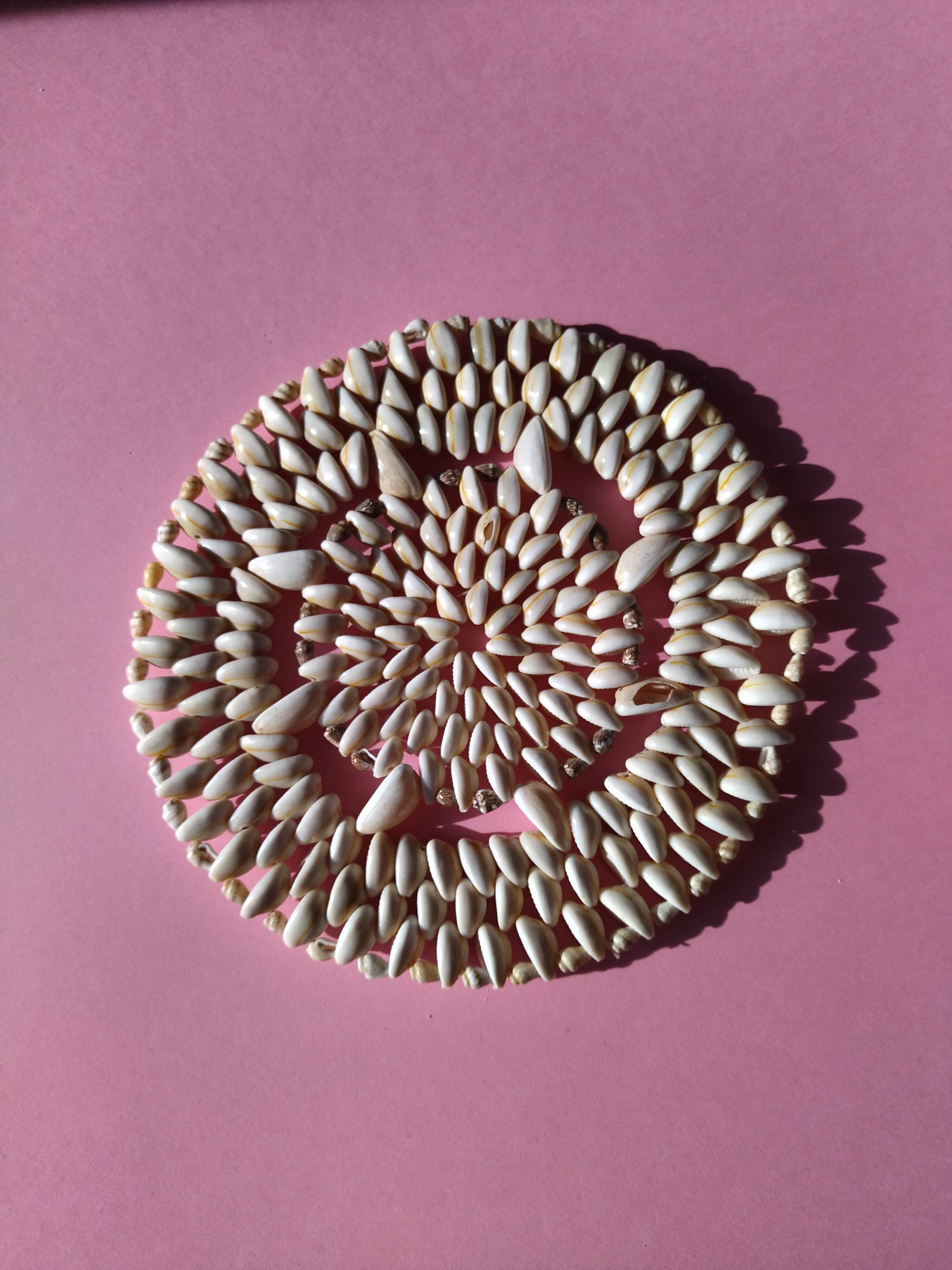 Old vintage shell coaster