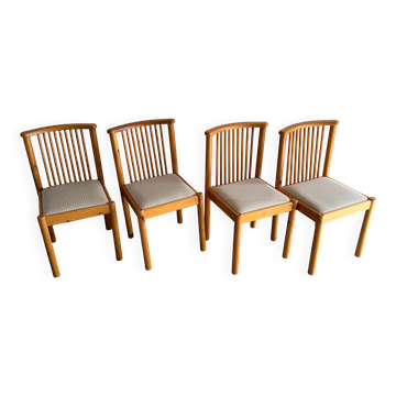 Set of 4 Scandinavian light wood dining chairs with beige polyester upholstered seats