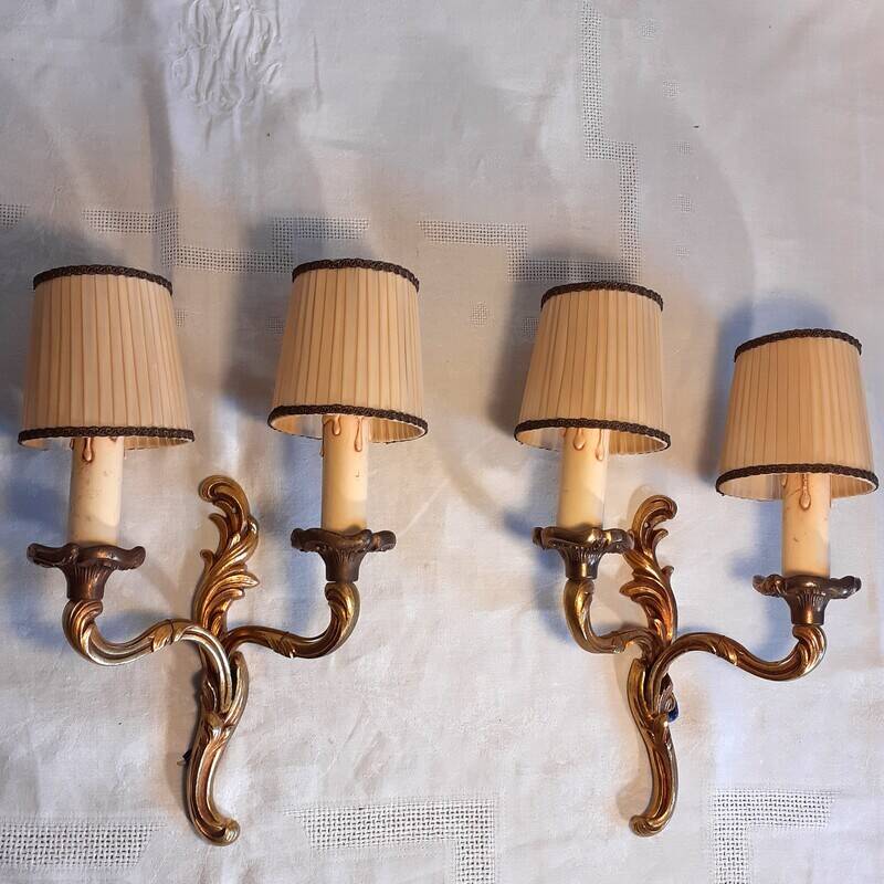 Pair of two-armed wall lights in gilded bronze, Louis XV style, by Lucien Gau.