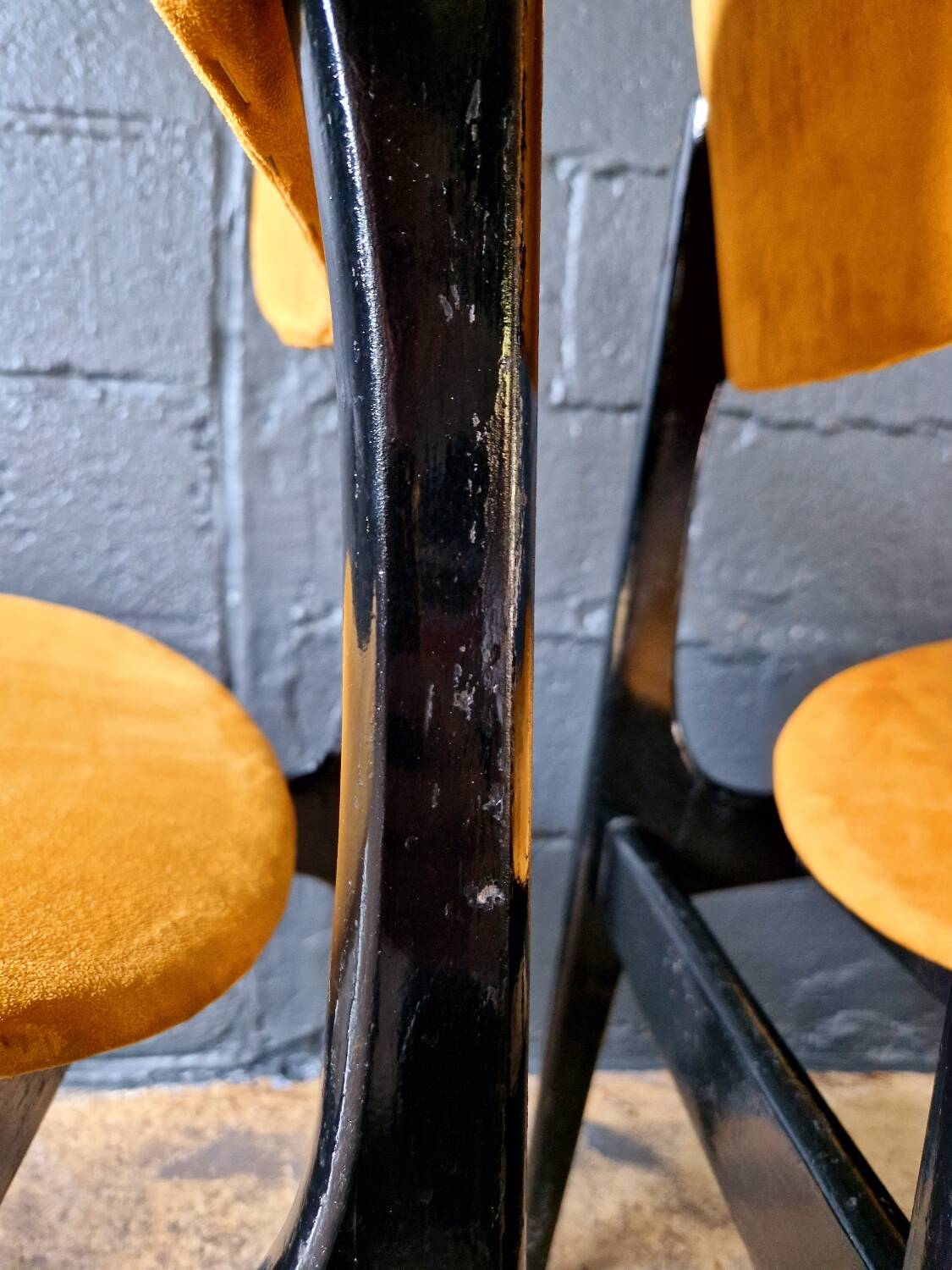 2 vintage chairs in black lacquered wood and yellow/mustard fabric, 1960