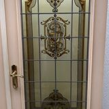 Wooden doors with stained glass