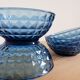 Blue bowls in chiseled glass
