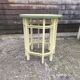 Yellow and green patinated pedestal table by a local artist