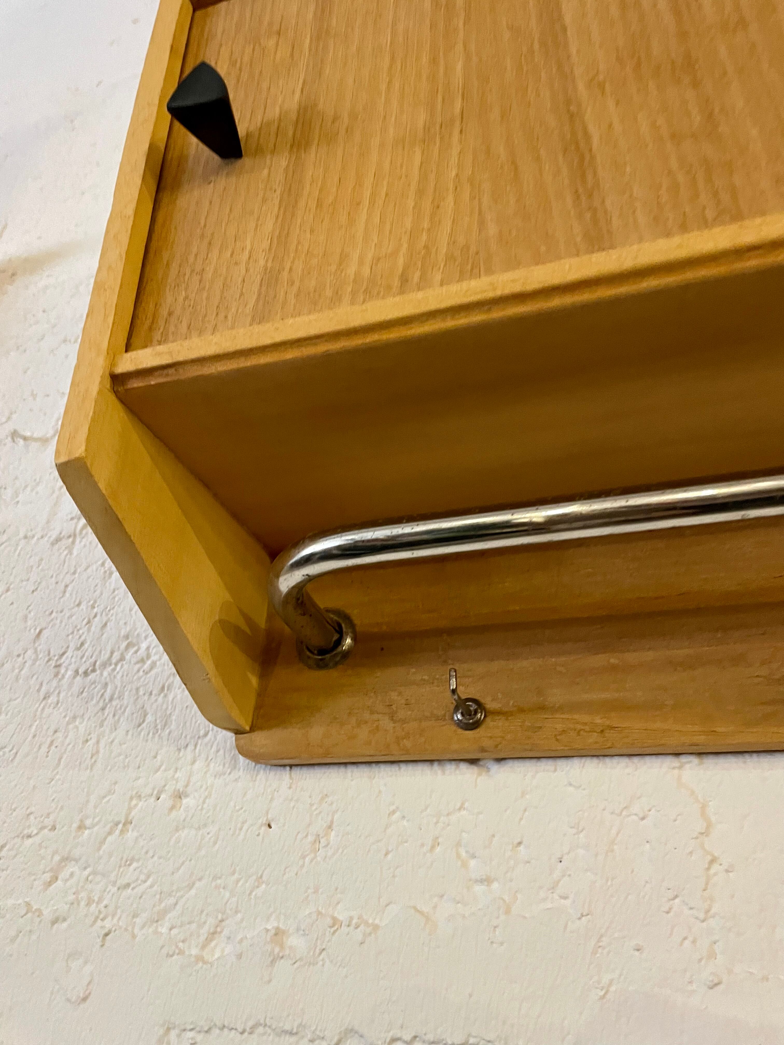 Hanging cabinet in vintage metal wood