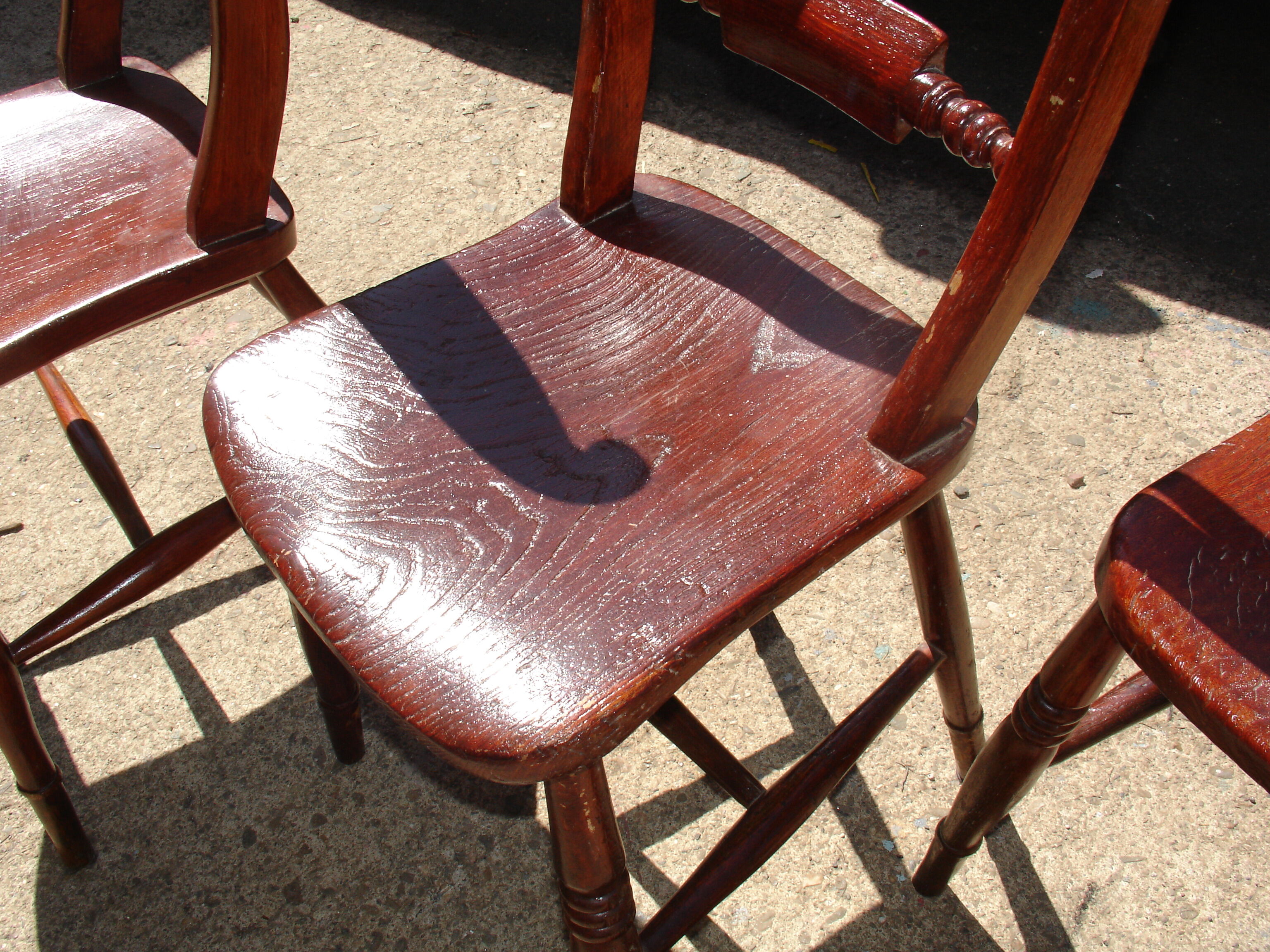 Set of 4 chairs in the style of 19th-century English Admiralty chairs, made of solid elm.