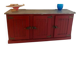 Low red "Guérande" buffet, zinc top, butcher's fridge-style doors