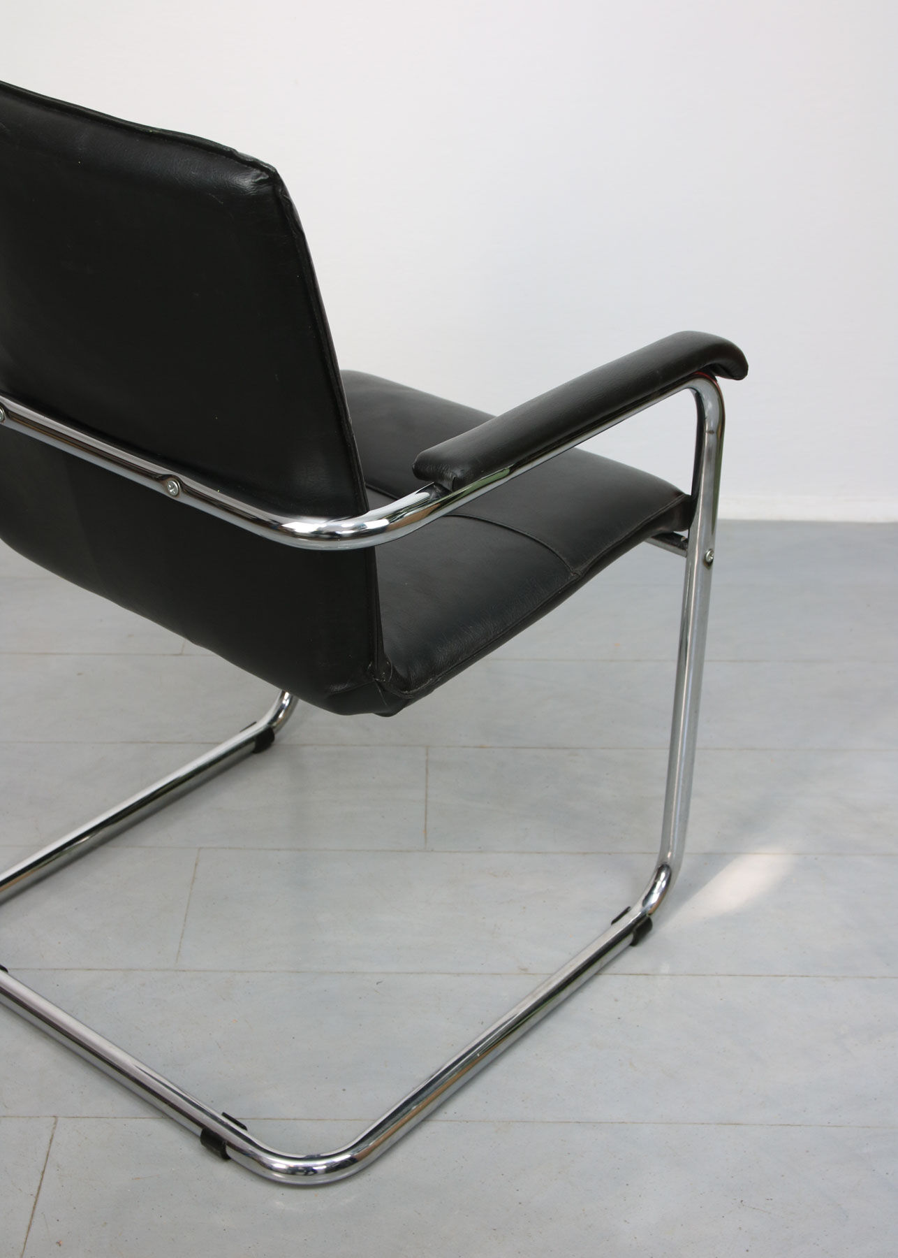 Vintage black leatherette office cantilever chair, 1970s