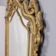 MIROIR MURAL DU DÉBUT DU XXE SIÈCLE EN BOIS DORÉ DE STYLE BAROQUE
