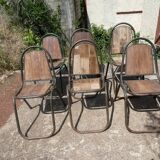 Set of 6 indu chairs in metal and exotic wood.