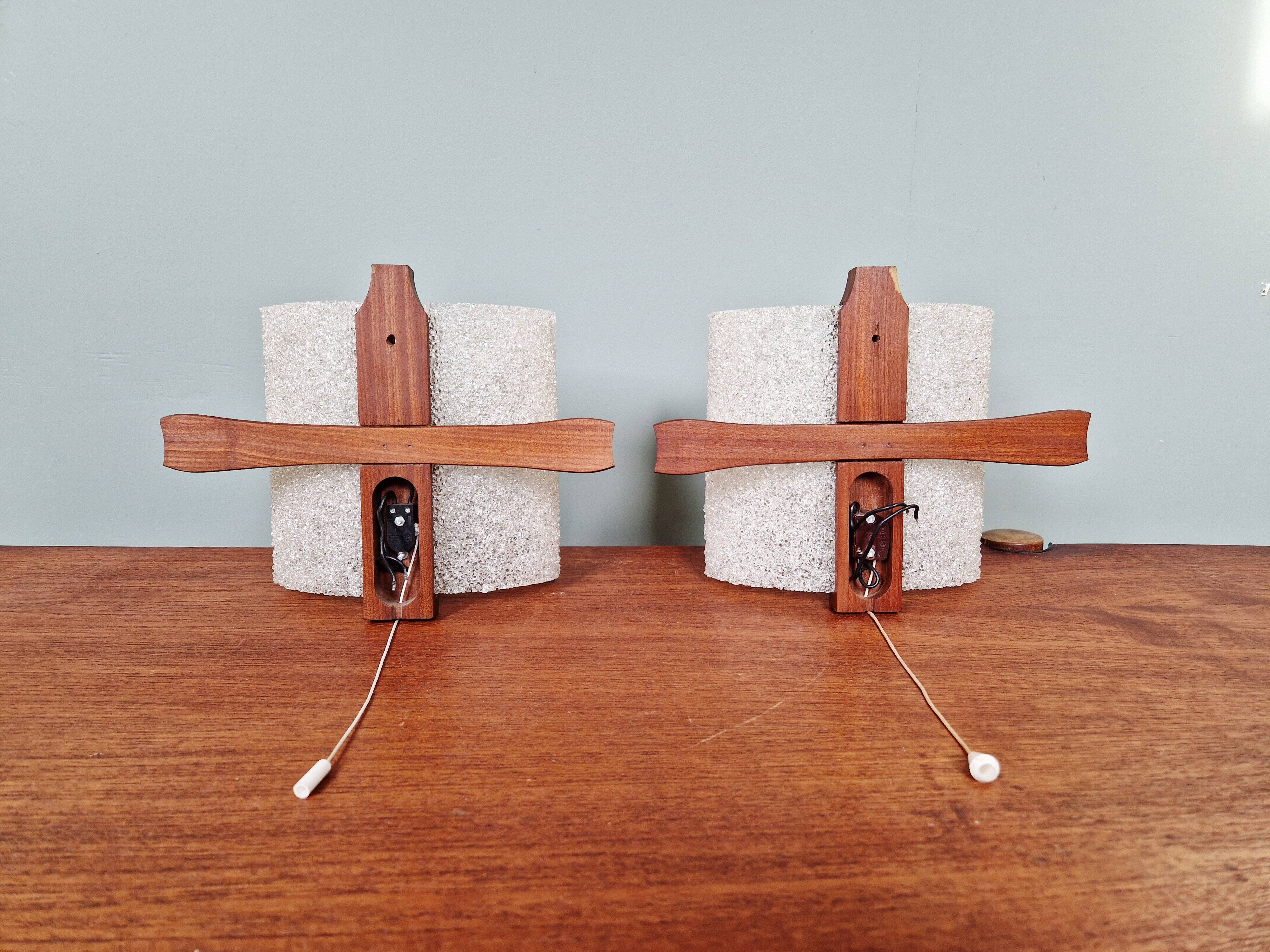 Pair of Scandinavian wall sconces in teak and plastic resin, 1960.
