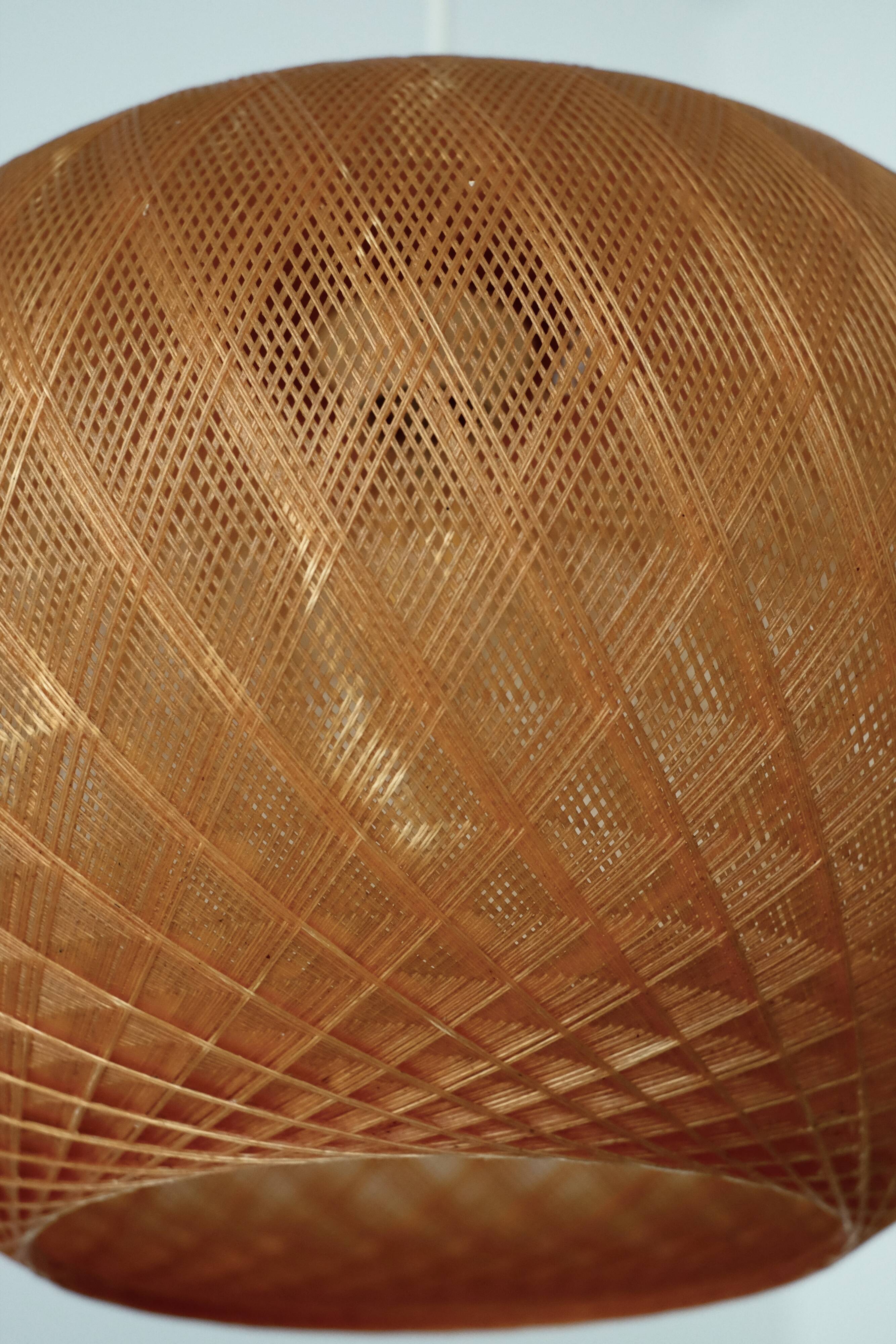 Suspension cocoon in nylon thread stretched thread rhodoïd