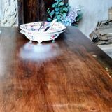 Old French farmhouse table in walnut with turned legs.