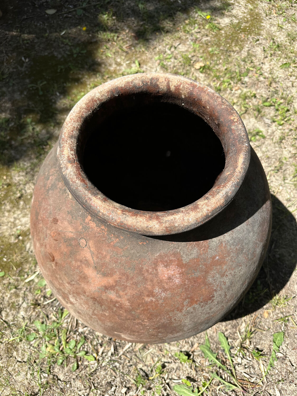 Ancient terracotta pottery jar from the 19th century.