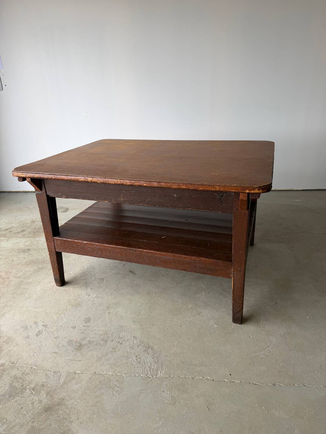 Antique draper's workbench / haberdashery table in solid wood from the early 20th century.