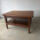 Antique draper's workbench / haberdashery table in solid wood from the early 20th century.