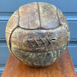 Mid-20th century leather soccer ball with visible stitching and beautiful patina
