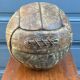 Mid-20th century leather soccer ball with visible stitching and beautiful patina