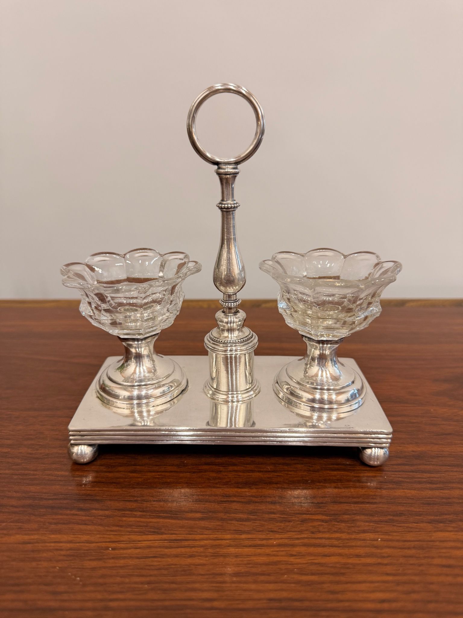Vintage silver-plated salt and pepper shaker set in crystal.