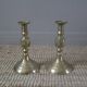 Pair of brass candlesticks in gold metal, ethnic tribal decoration, bohemian artisanal production