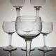 9 verres à vin guillochés déb. XXème