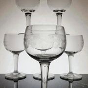 9 guilloché wine glasses, early 20th century.