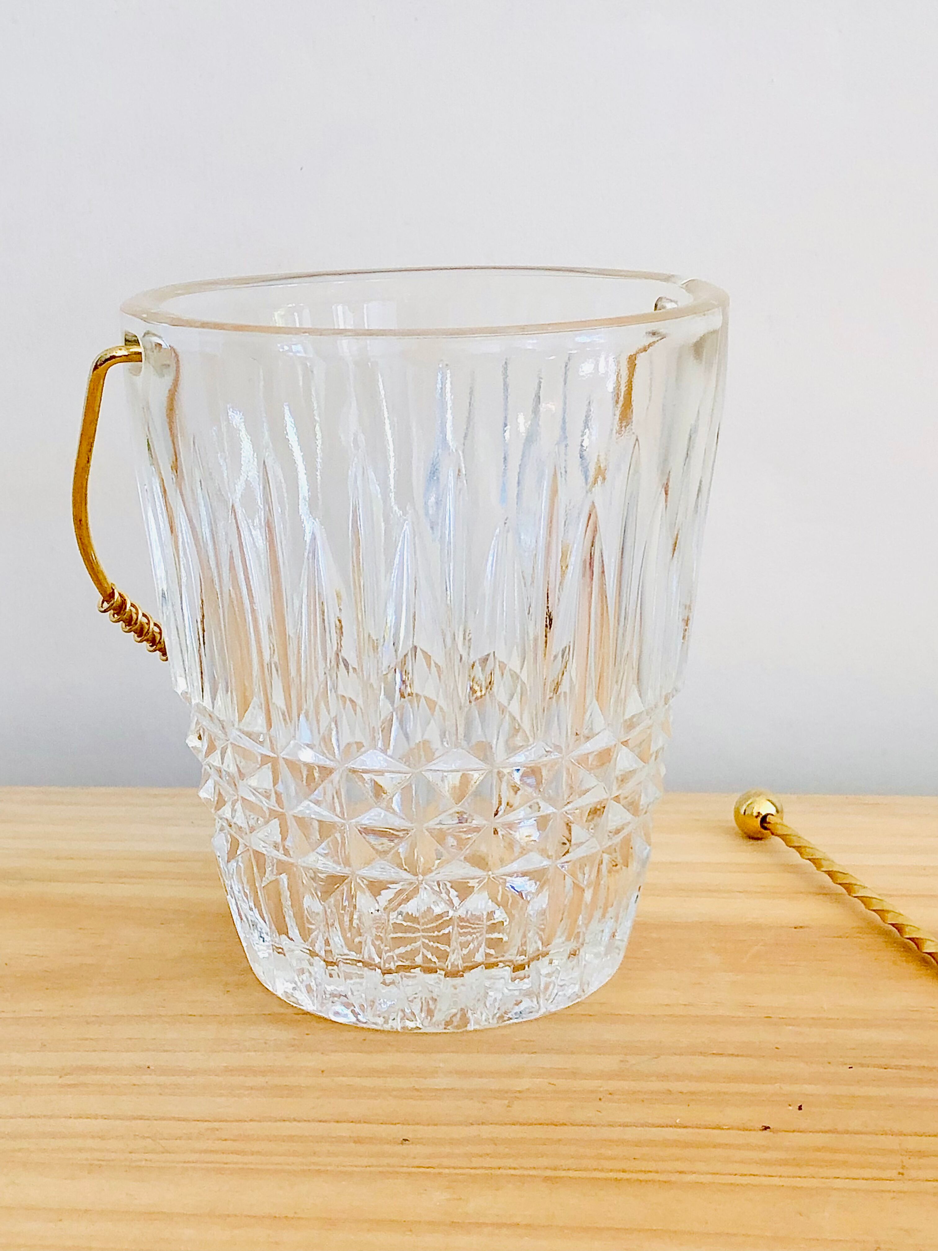 Crystal ice bucket and spoon thereof