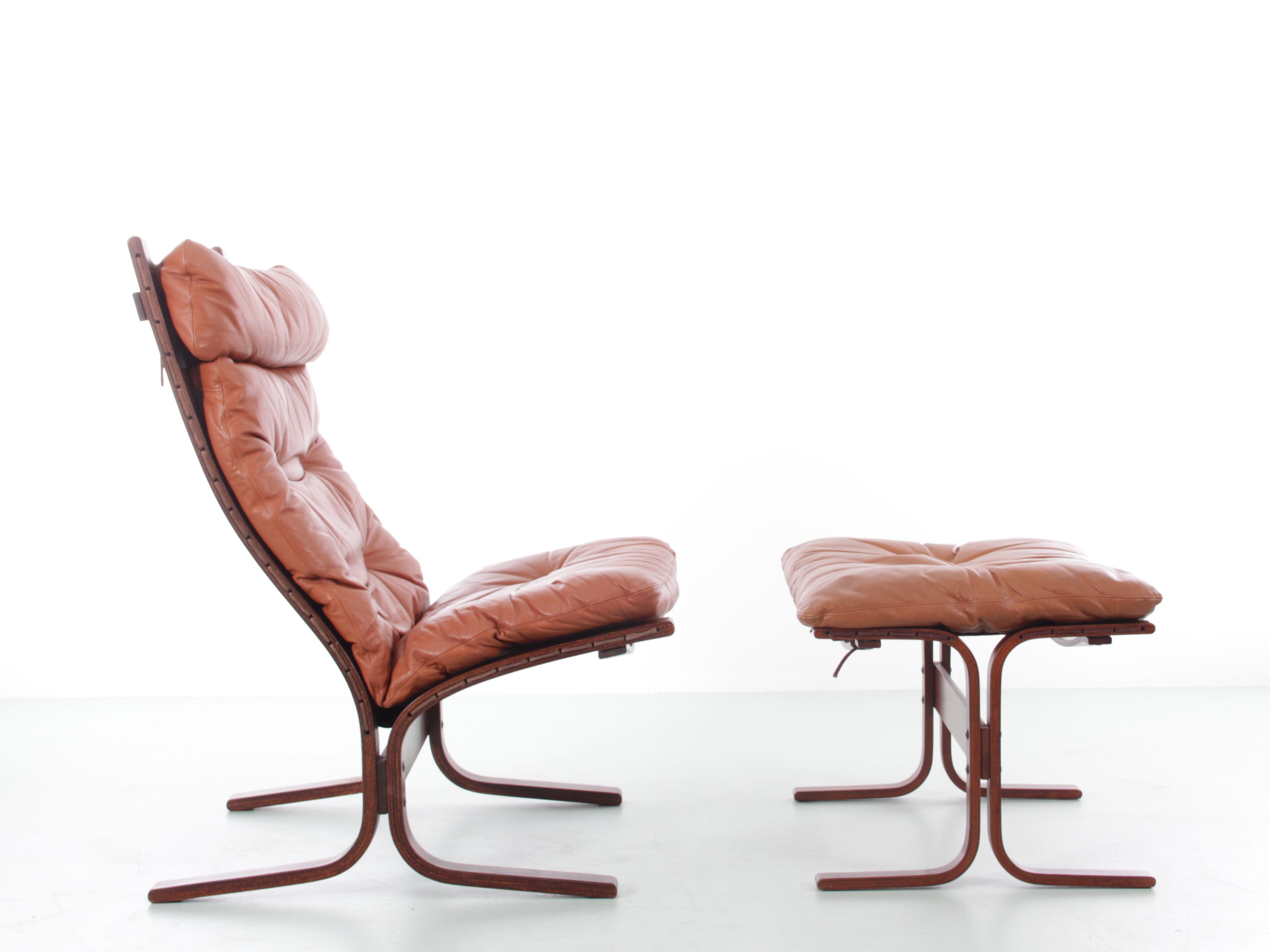 Scandinavian chair model Siesta, high back and foot rests