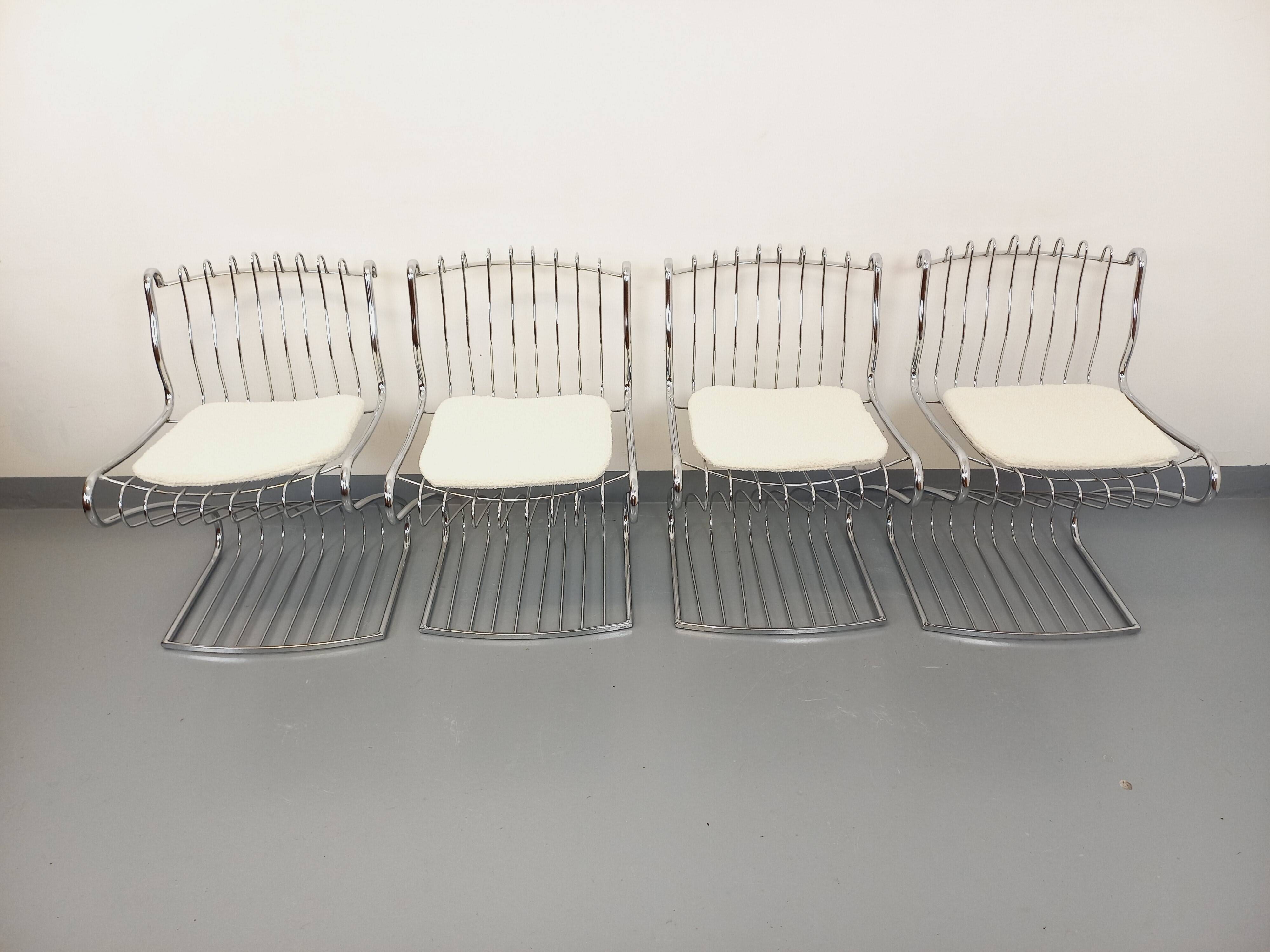 Set of 4 vintage Italian chairs by Gastone Rinaldi in chrome metal.