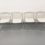 Set of 4 vintage Italian chairs by Gastone Rinaldi in chrome metal.