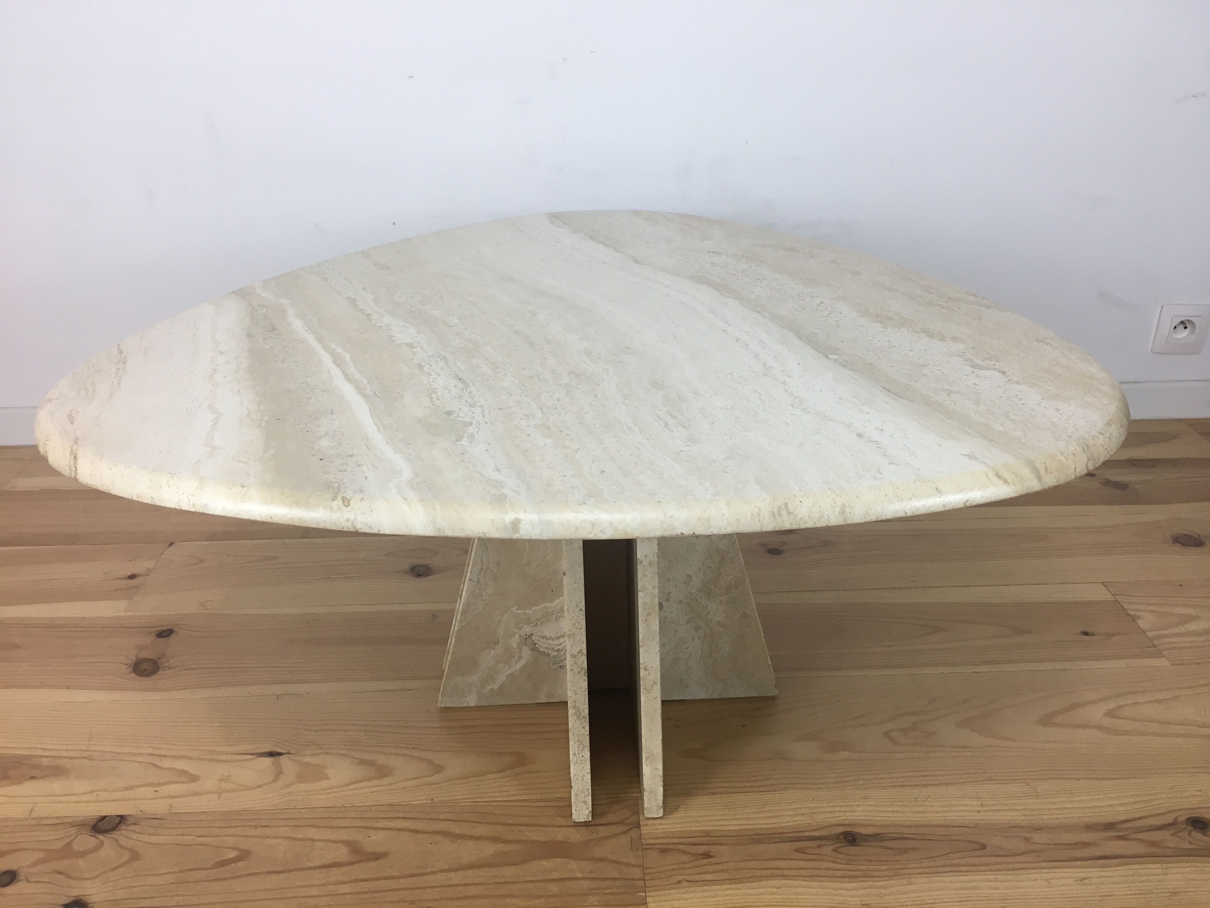 Travertine coffee table goes up and down to jack