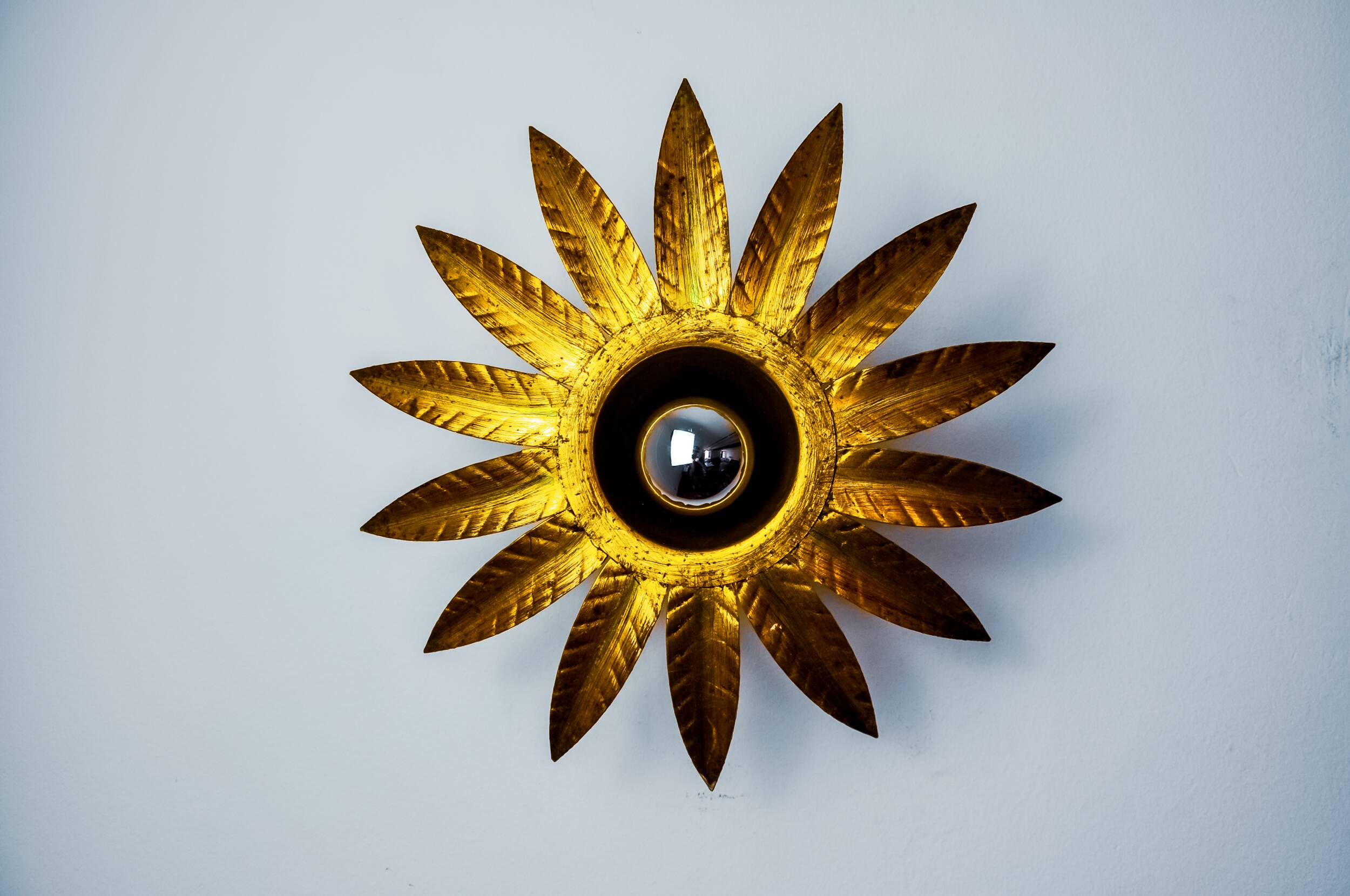 Sun wall lamp by ferro arte, metal and gold leaf, Spain, 1960