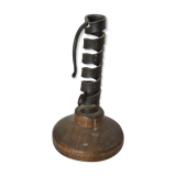 Candle holder with iron and wood pusher