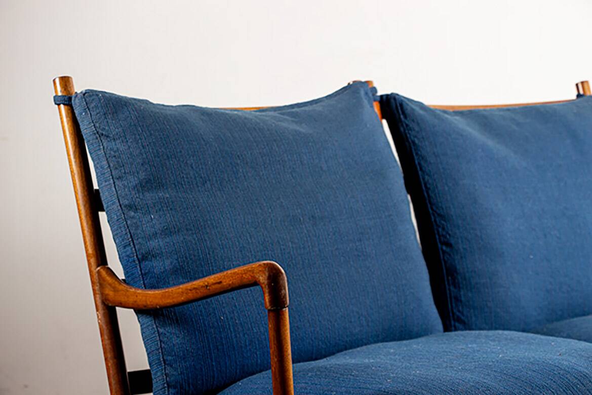 Danish 2-seater sofa in mahogany and cane by Ole Wanscher, 1960.