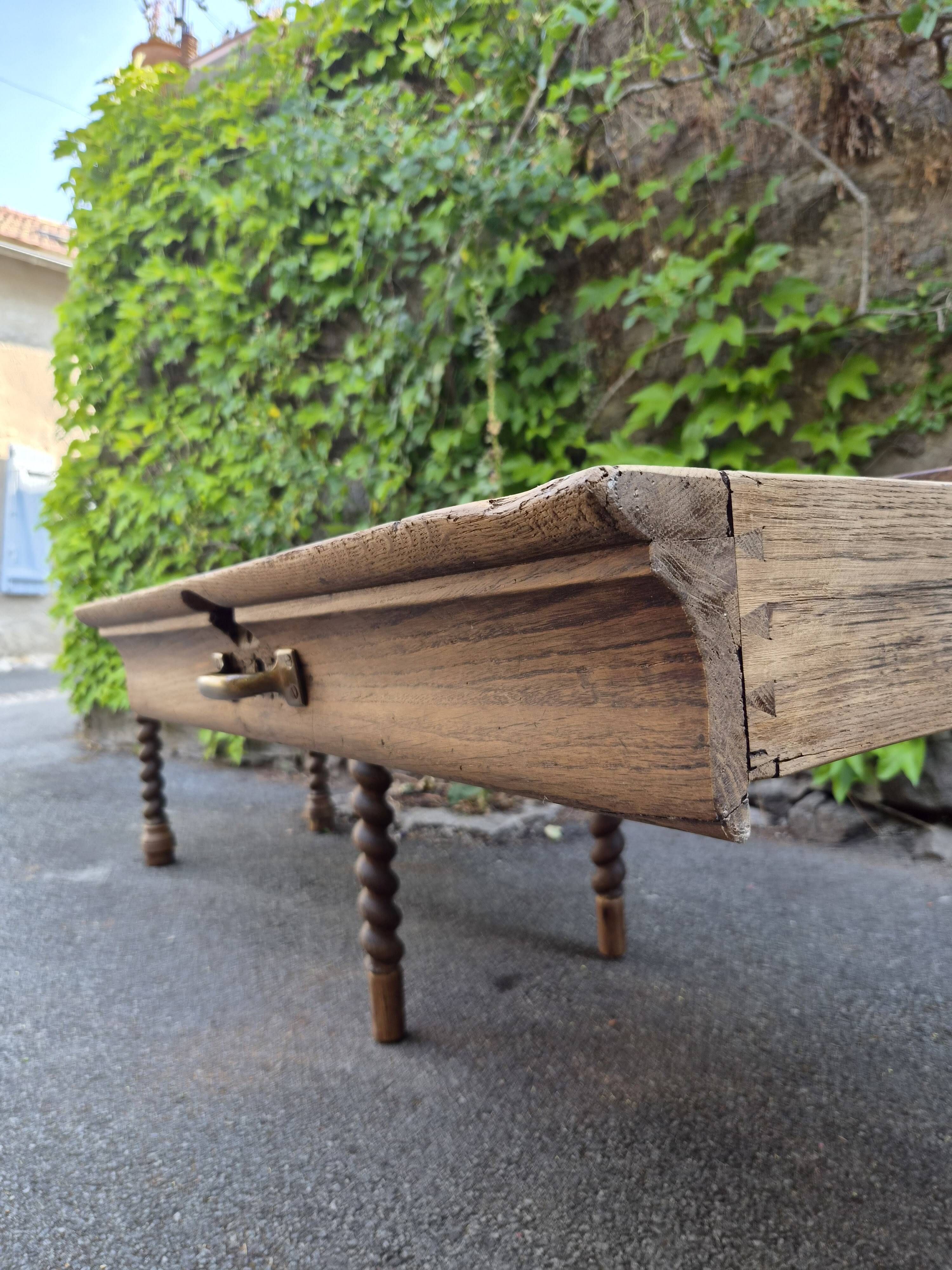 Antique French draper's table in oak, shop counter, work table, 6 feet, circa 1750–1850.