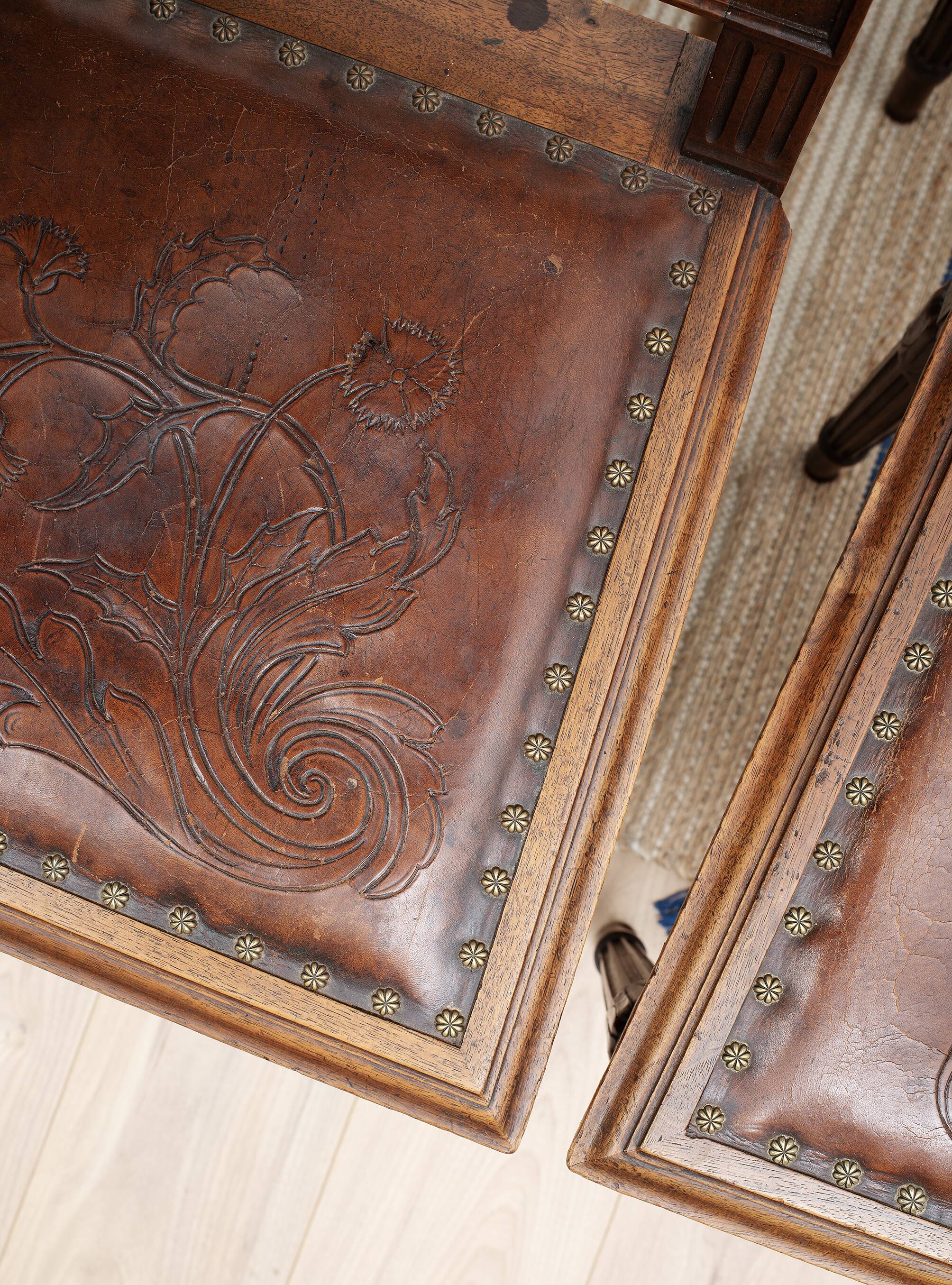 Set of 4 Louis XVI style chairs in carved wood and embossed leather.