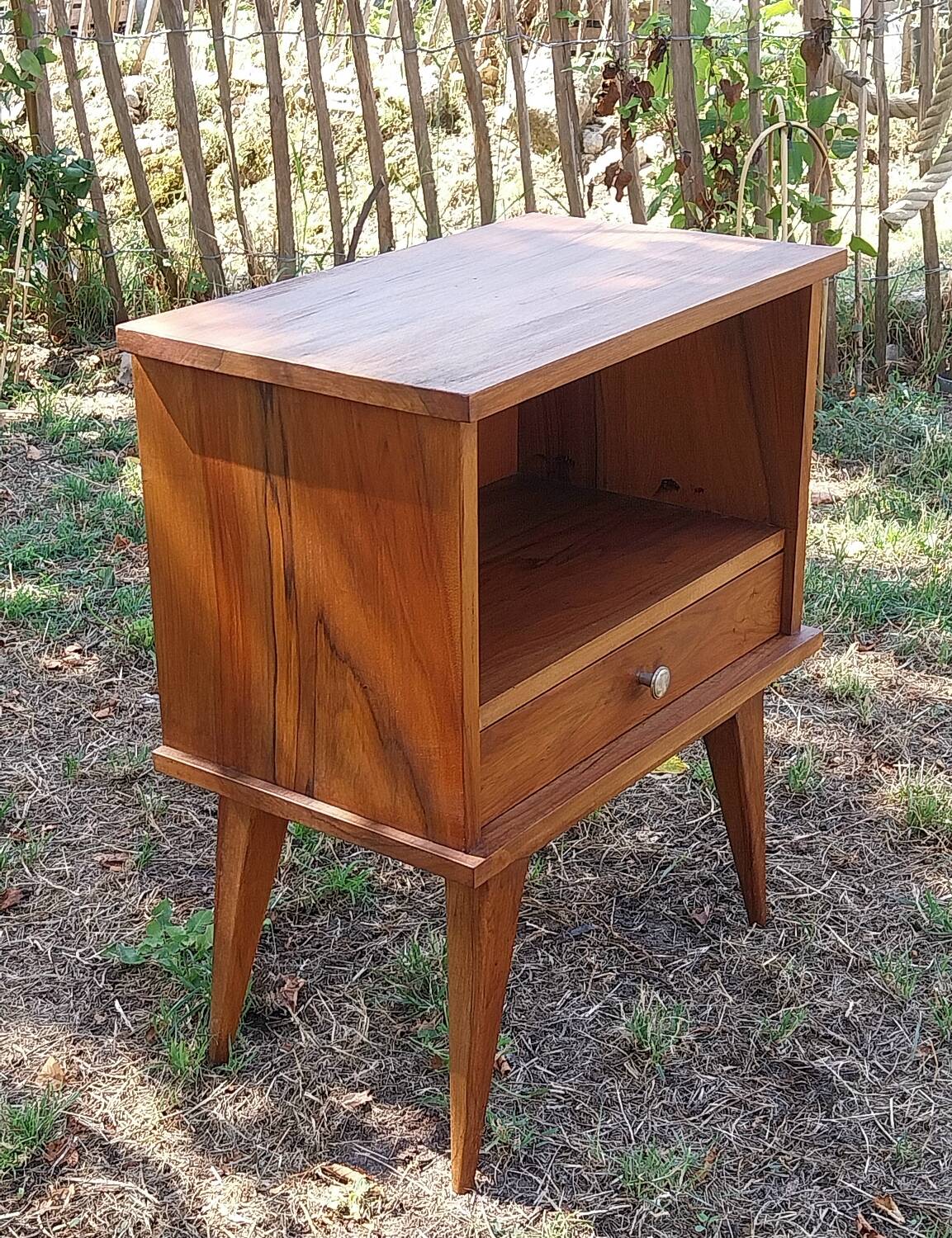 Wooden bedside table with compass feet