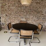 1 Dining table and its 8 chairs in canelet year 70