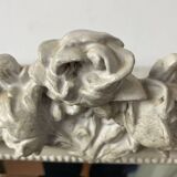 Large antique beveled mirror in carved wood painted with floral decoration and
