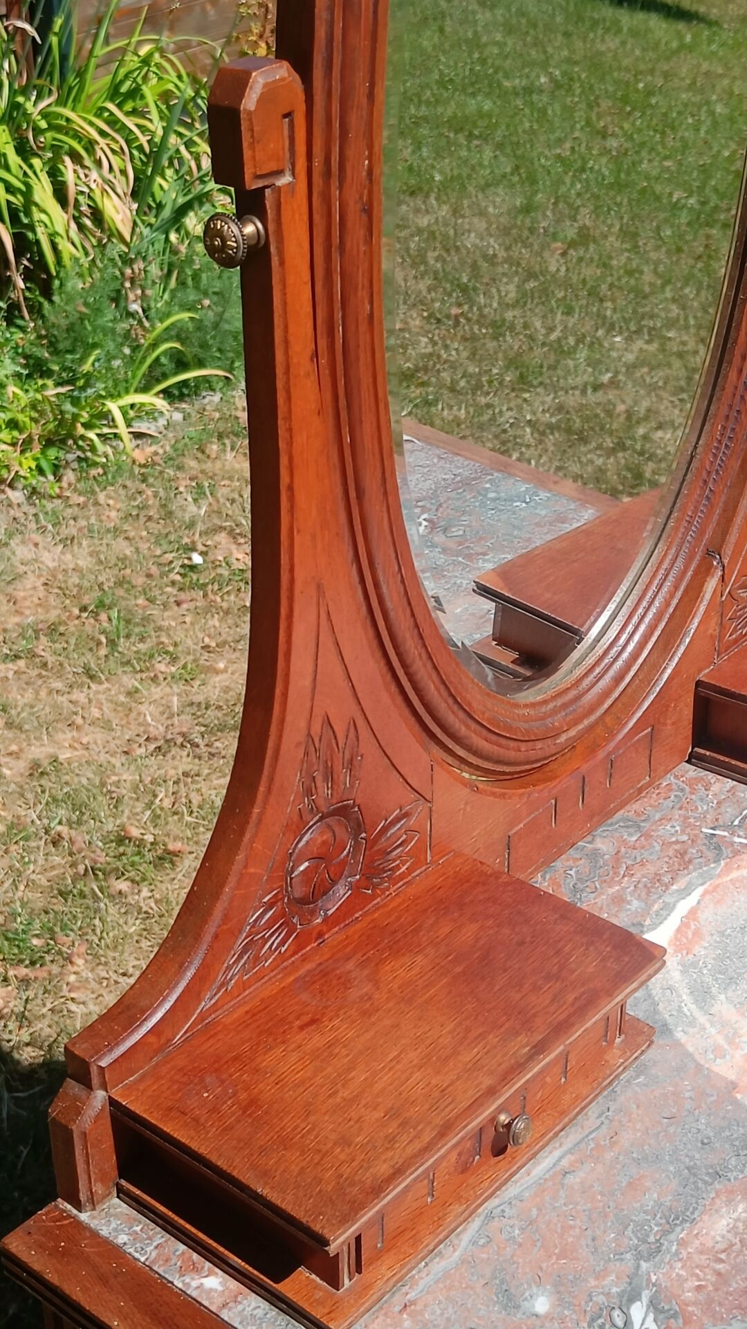 Art Deco oak dressing table, marble top and swivel mirror.